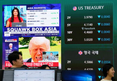 World shares mostly gain as investors watch Trump-Xi summit