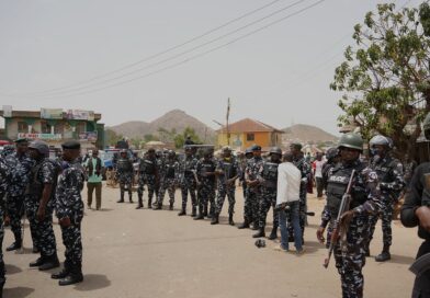 Armed group in Nigeria kills at least 20 people and exchanges gunfire with police