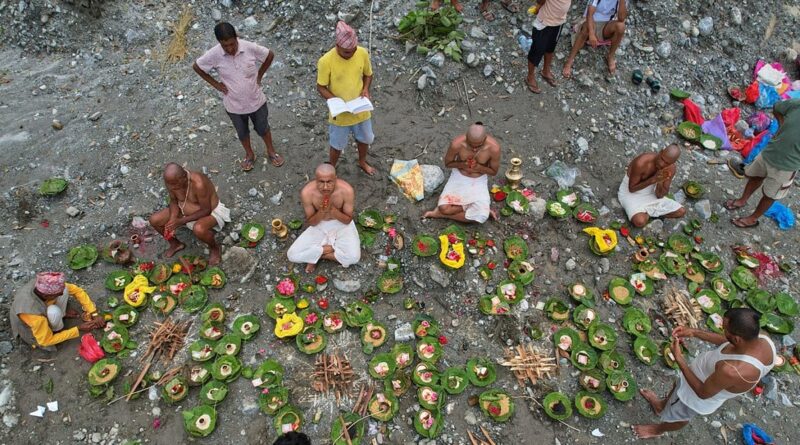 Symbolic funerals held in Nepal for those feared lost as some missing tourists make contact